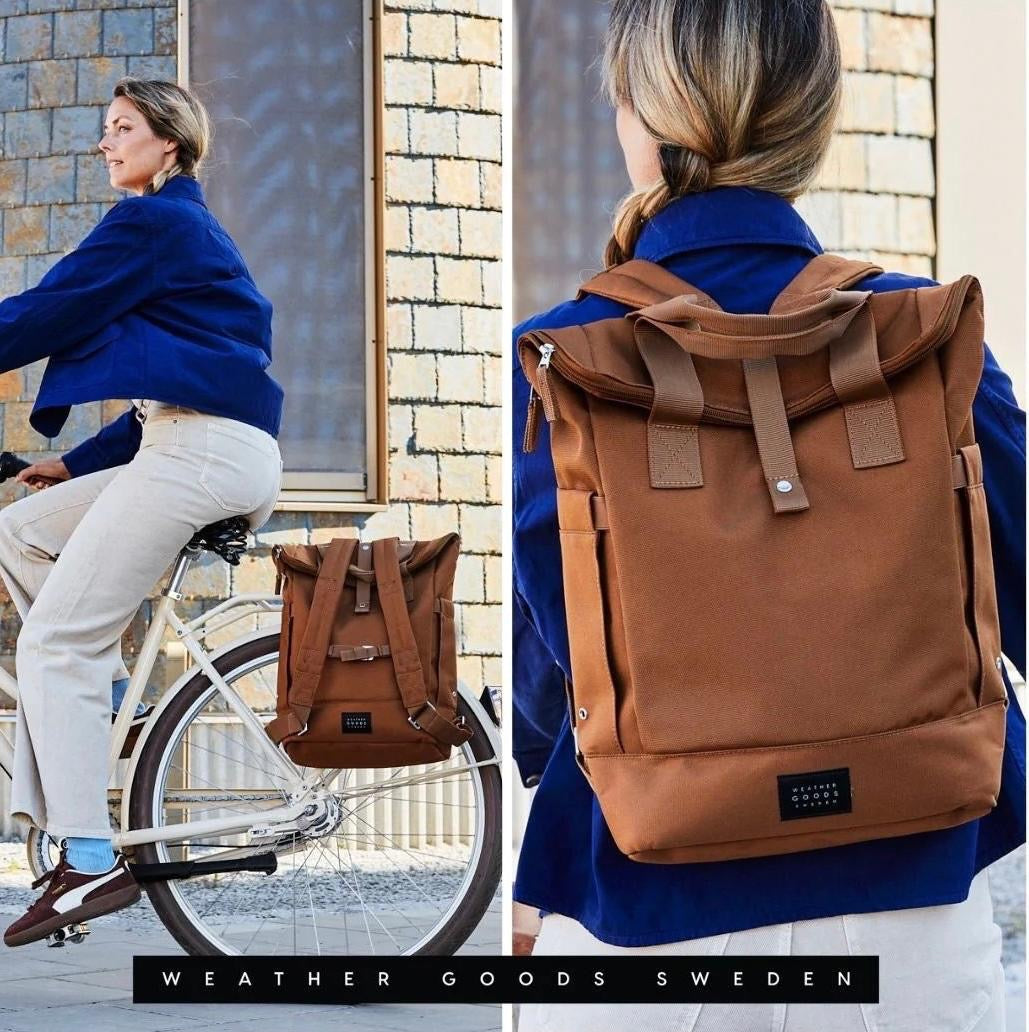 Frau mit hybrider Fahrradtasche am Fahrrad und als Rucksack getragen – Weather Goods Sweden bei HOLE-X