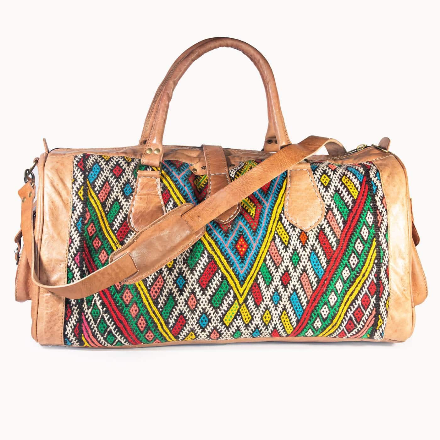 DOENYA Reisetasche 'Kilim X' aus pflanzlich gegerbtem Leder und echtem marokkanischem Kilim