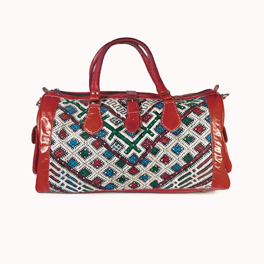 DOENYA Reisetasche "Kilim S" aus pflanzlich gegerbtem Leder und echtem marokkanischem Kilim - rot - HOLE-X-WORLD