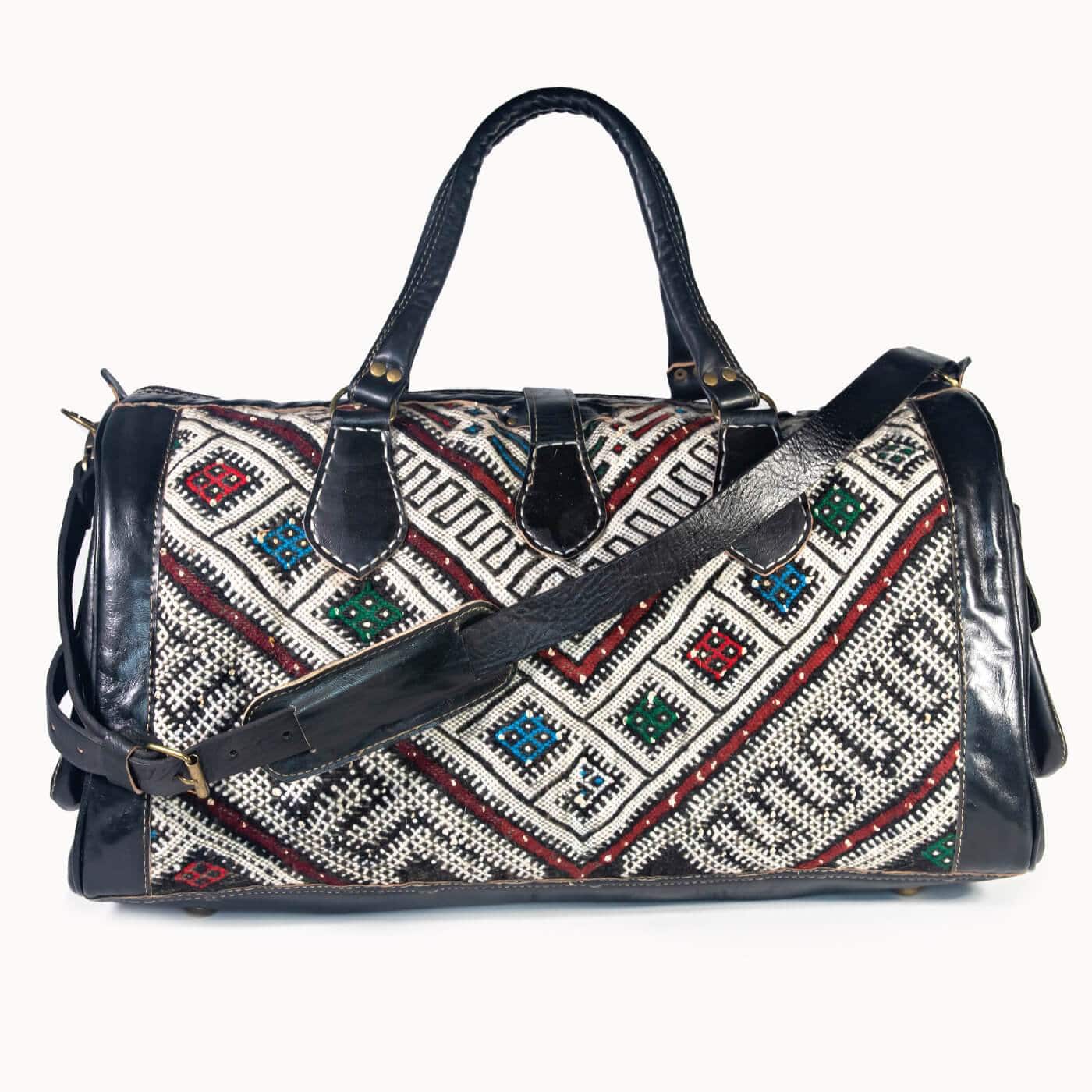 DOENYA Reisetasche 'Kilim X' aus pflanzlich gegerbtem Leder und echtem marokkanischem Kilim