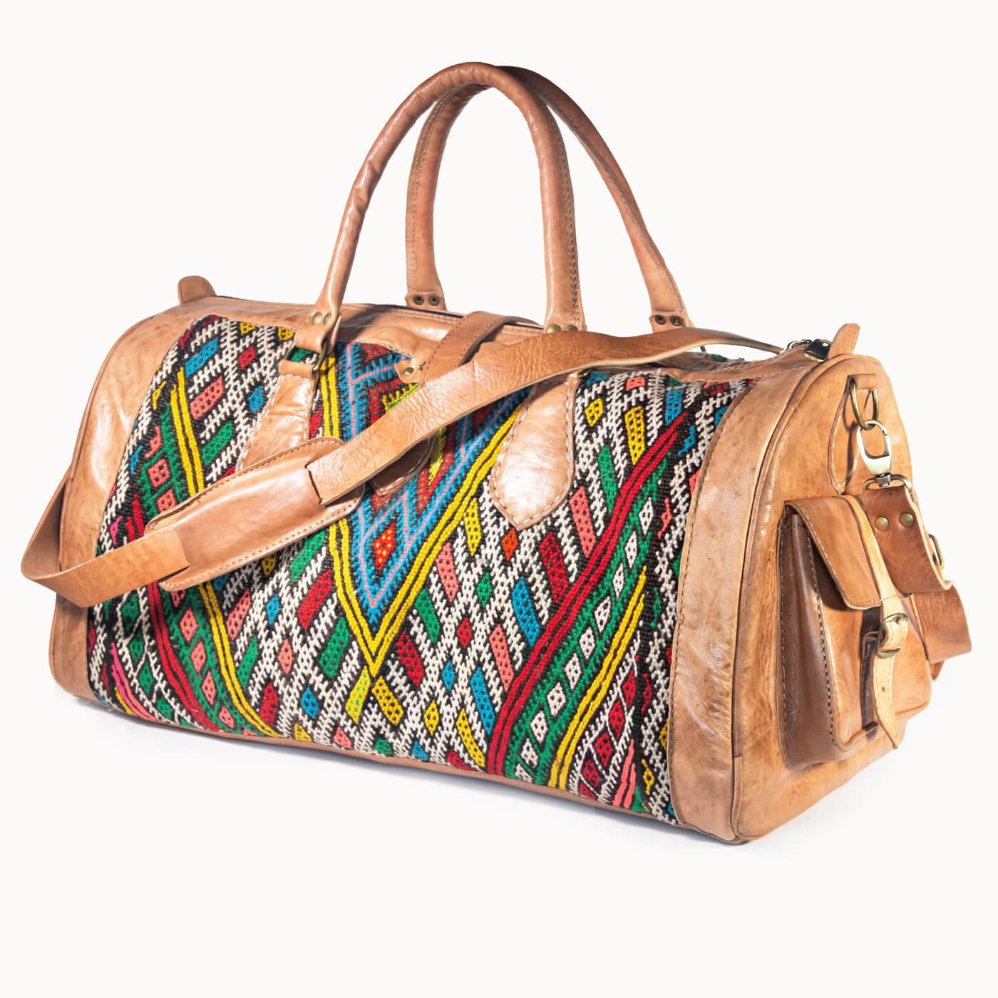 DOENYA Reisetasche 'Kilim X' aus pflanzlich gegerbtem Leder und echtem marokkanischem Kilim